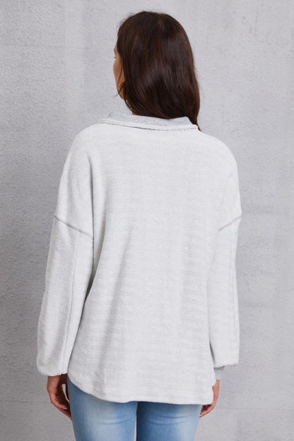 Relaxed Style with a Touch of Detail: Half Button Dropped Shoulder Sweatshirt