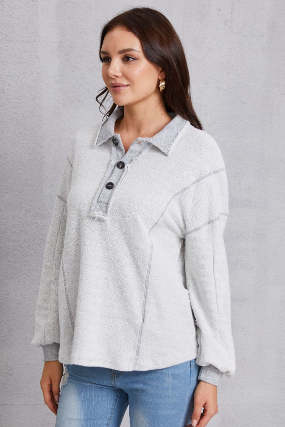 Relaxed Style with a Touch of Detail: Half Button Dropped Shoulder Sweatshirt