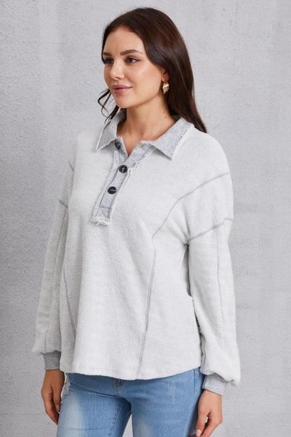 Relaxed Style with a Touch of Detail: Half Button Dropped Shoulder Sweatshirt