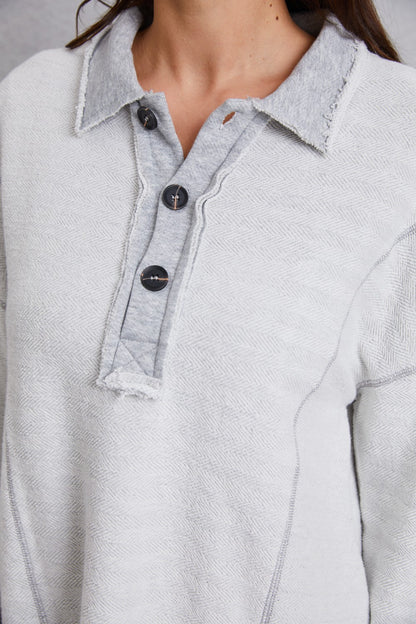 Relaxed Style with a Touch of Detail: Half Button Dropped Shoulder Sweatshirt