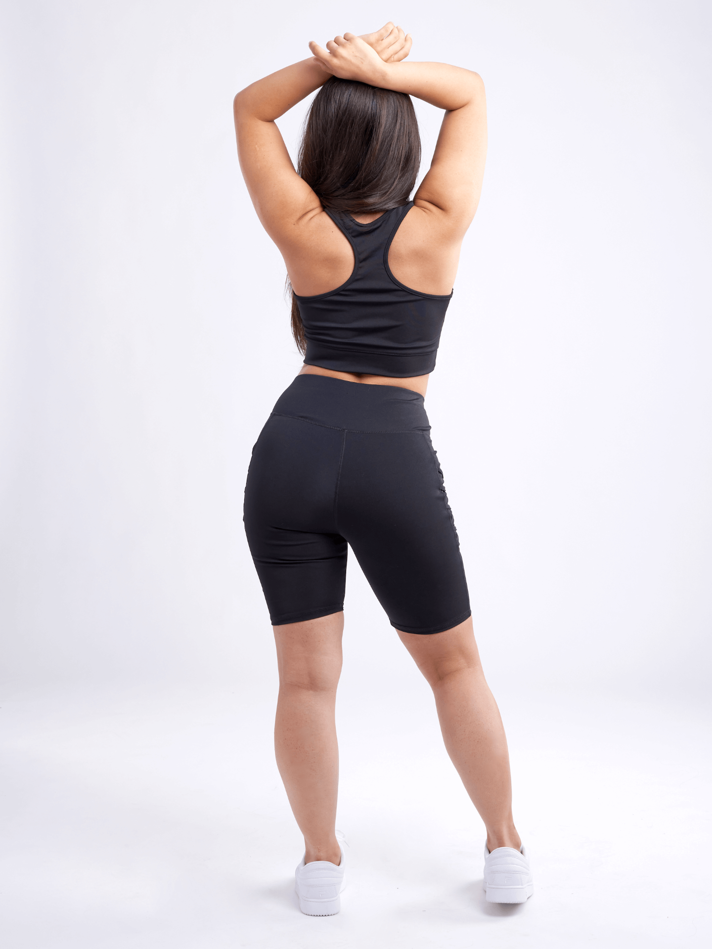 High-Waisted Workout Shorts with Pockets & Criss Cross Design